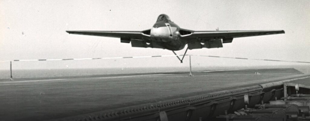 de Havilland Sea Vampire landing on flexible flight deck on HMS Warrior