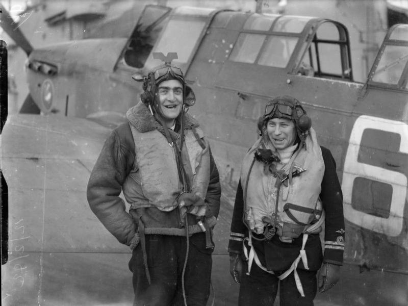 Fairey Fulmar observer Lieutenant G J Stavgley (left) and Lieutenant M J S Newman on board HMS Victorious