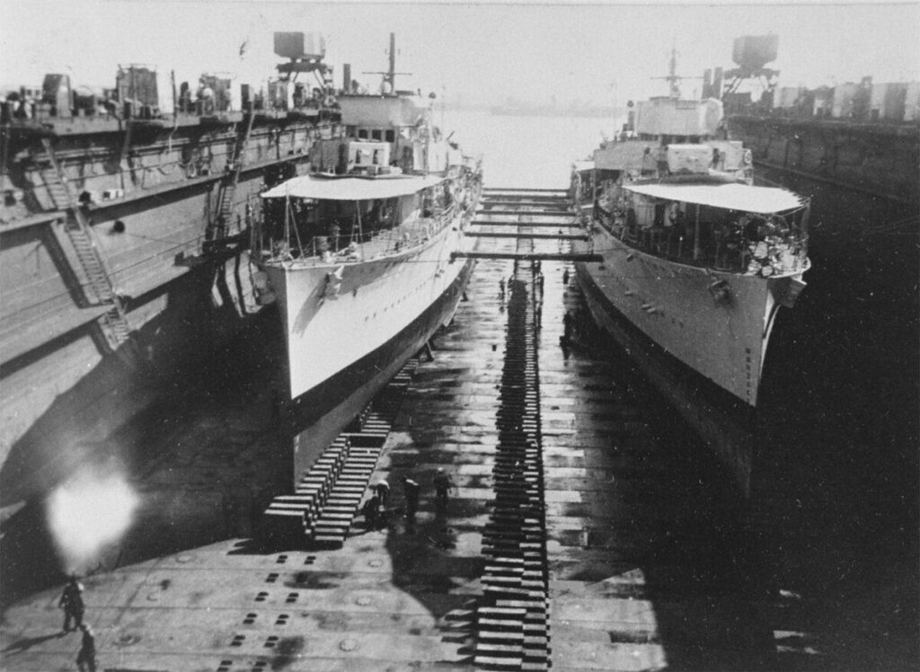 HMAS Vampire and HMAS Vendetta under repair in dry dock on the island of Malta. December 1939