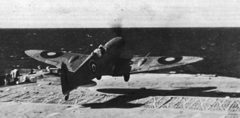 Supermarine Seafire Mk IIC of No 807 Squadron just airborne over the windbreak of HMS Furious during Operation Torch