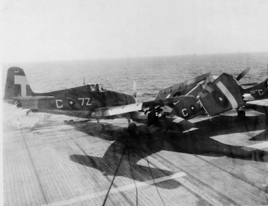 Hellcat JW715 (C-7Z) of 808 NAS enters the barrier after hitting his tail on the rounddown f HMS Khedive