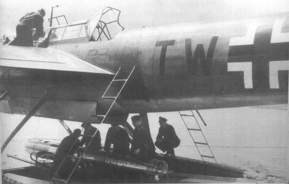 Loading a torpedo onto a Heinkel He 115