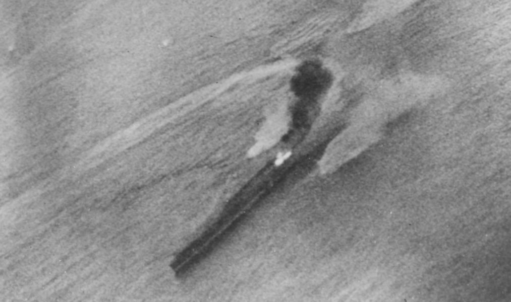 Chiyoda is hit aft and near-missed several times during air attacks by TF-58 planes, 20 June 1944