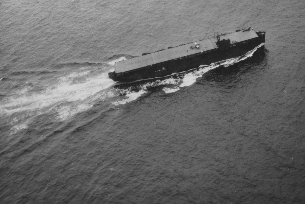 Grumman F4F-4 Wildcats landing aboard USS Nassau (CVE-16) in the South Pacific, September 1943