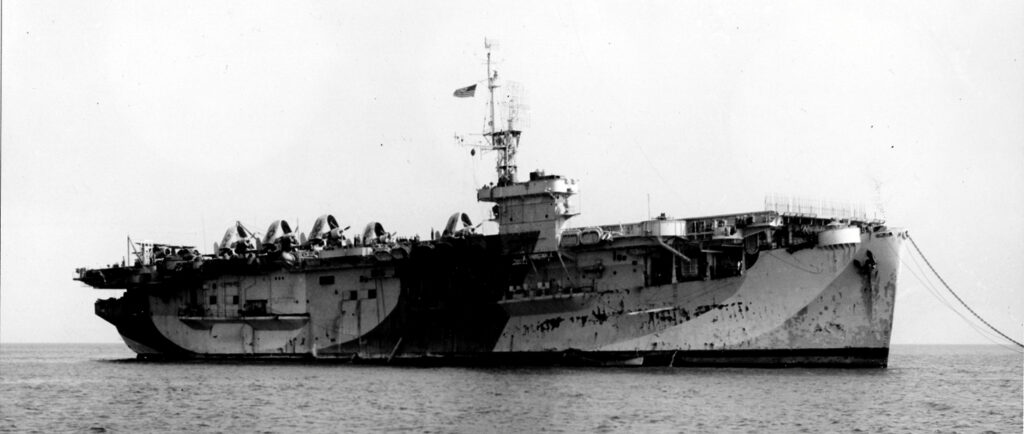 USS Nassau (CVE-16) wearing a weathered 33-2A camouflage scheme on 24 July 1944, off Point Mugu, California